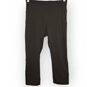 Lululemon In Movement Crop *Everlux 19" Dark Olive size 6